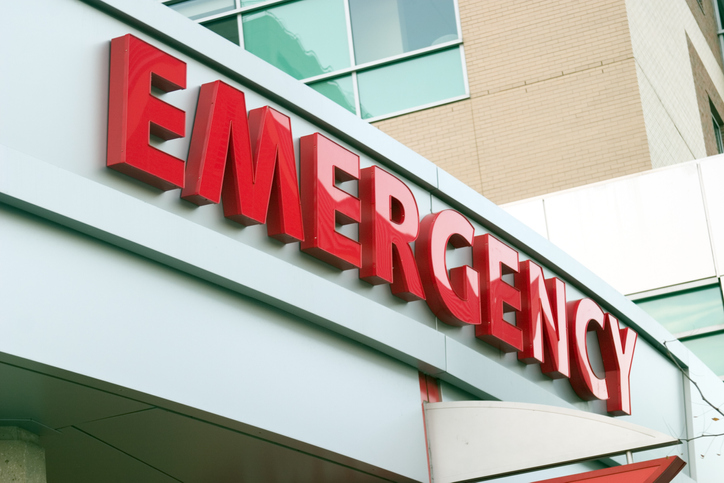 Close up photo of red large letters spelling emergency