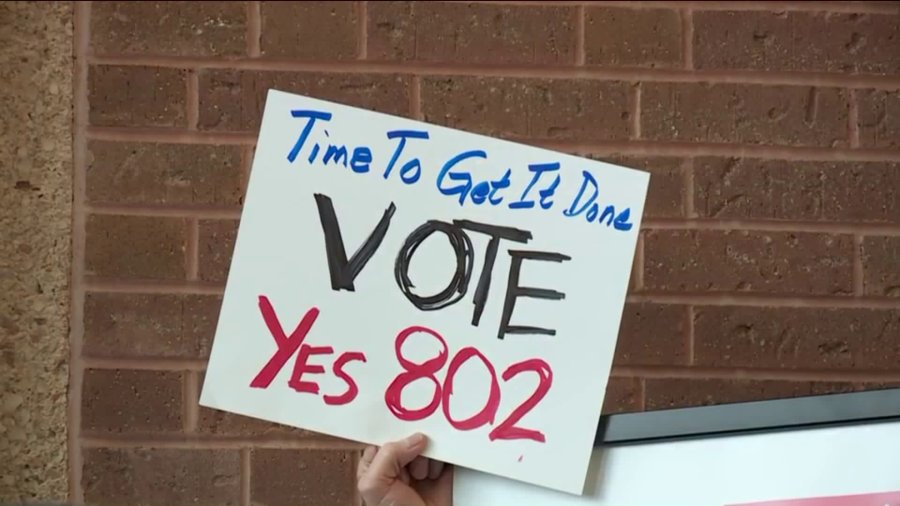 Volunteers turn in signatures for Yes on 80