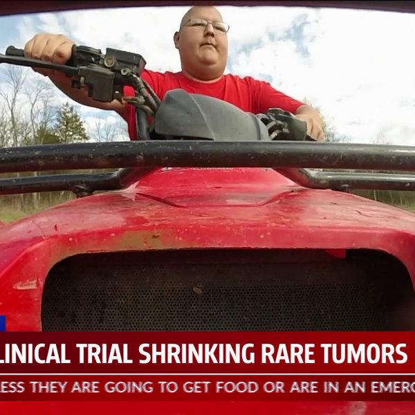 Young man rides four wheeler