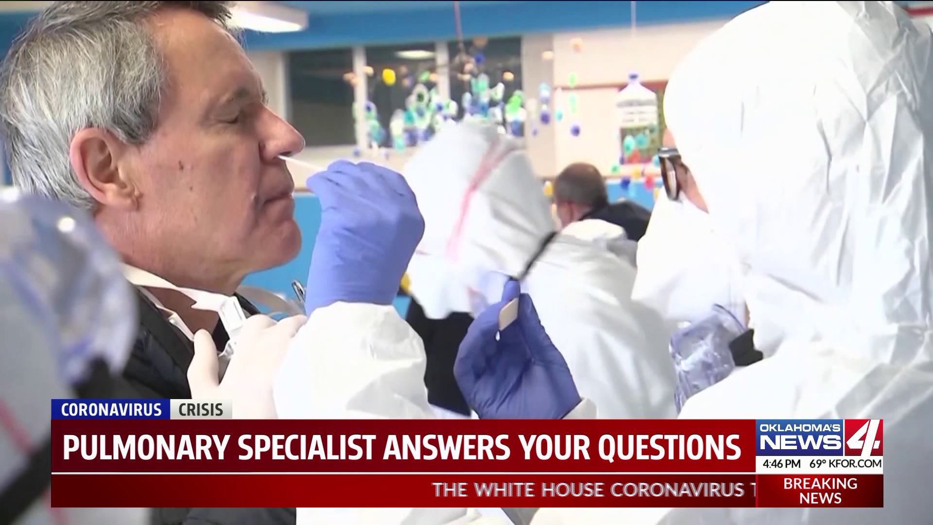 Medical professional administers COVID-19 test to man