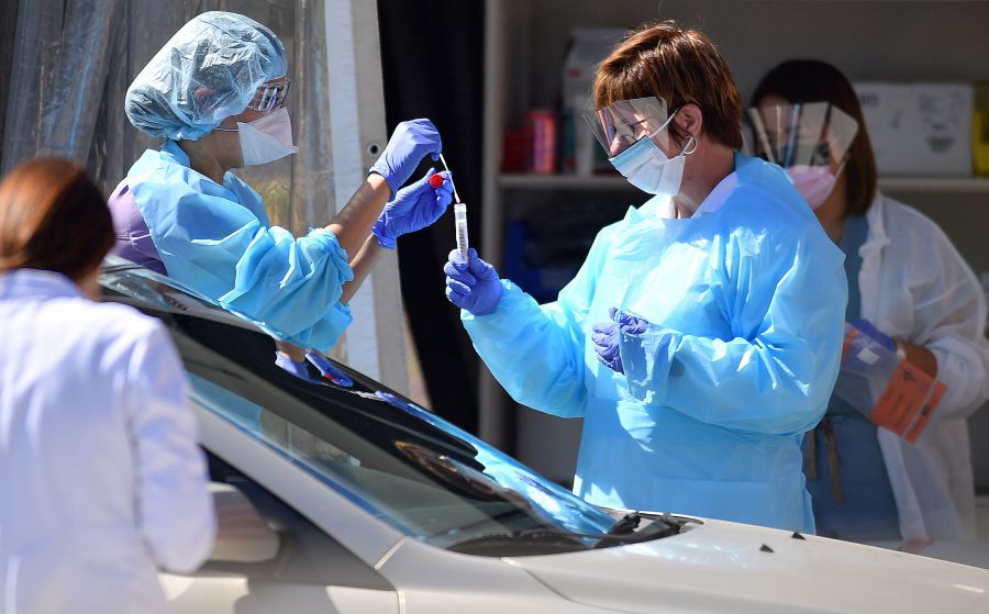 picture of health care workers taking swabs