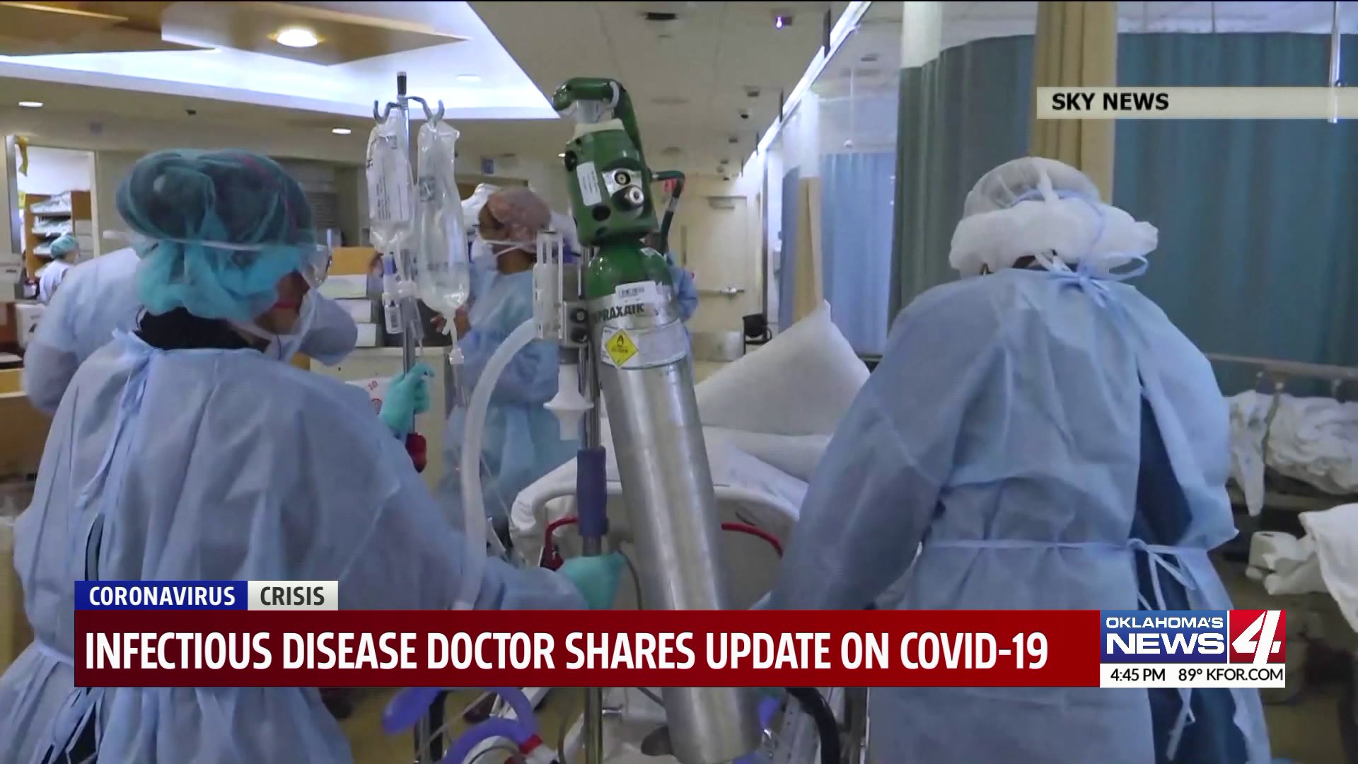 healthcare workers push patient bed and equipment