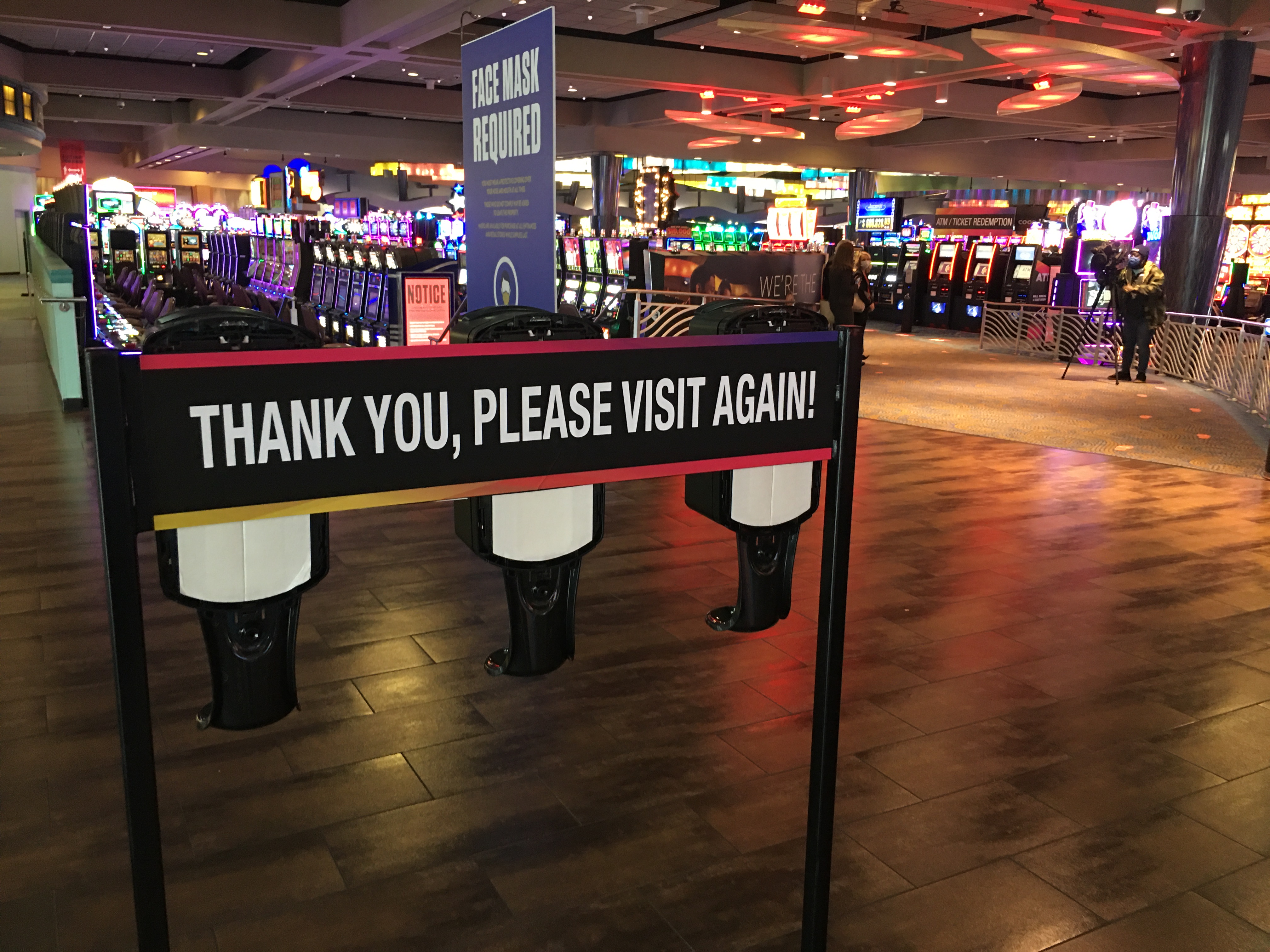 Sign at casino that reads 'thank you, please visit again'